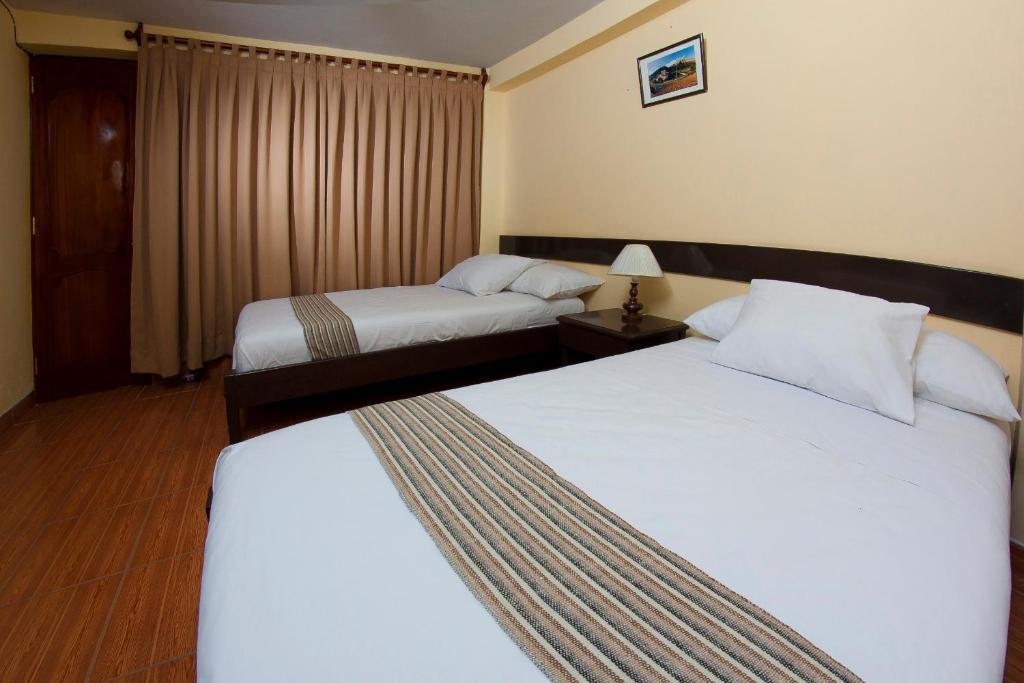 Yucay Plaza Inn Kamer foto